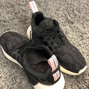 Pink and black Adidas NMD’s
